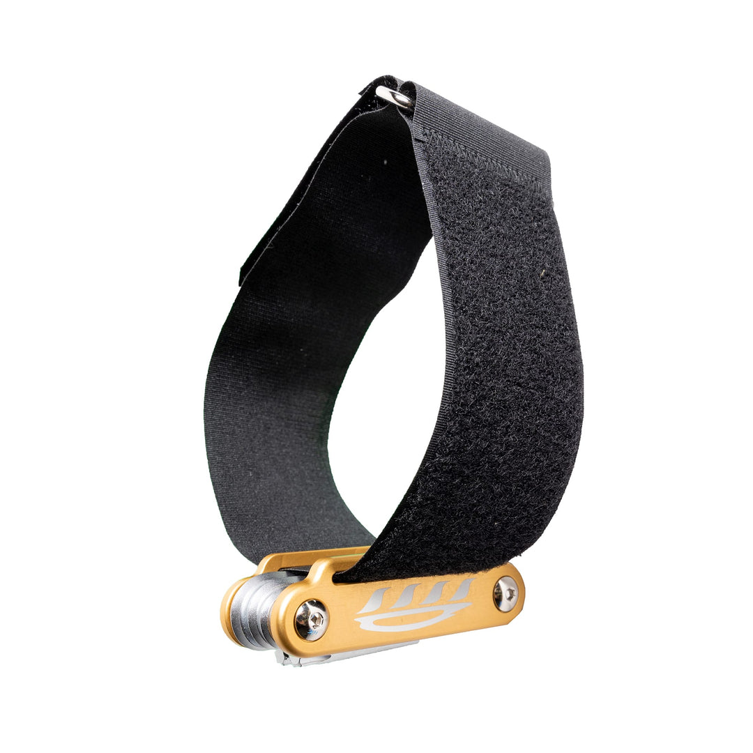 Cedrus Foil Tool wrapped around a velcro strap showcasing its functionality and ease of access, designed to stay secure on your wrist or equipment during intense foiling sessions