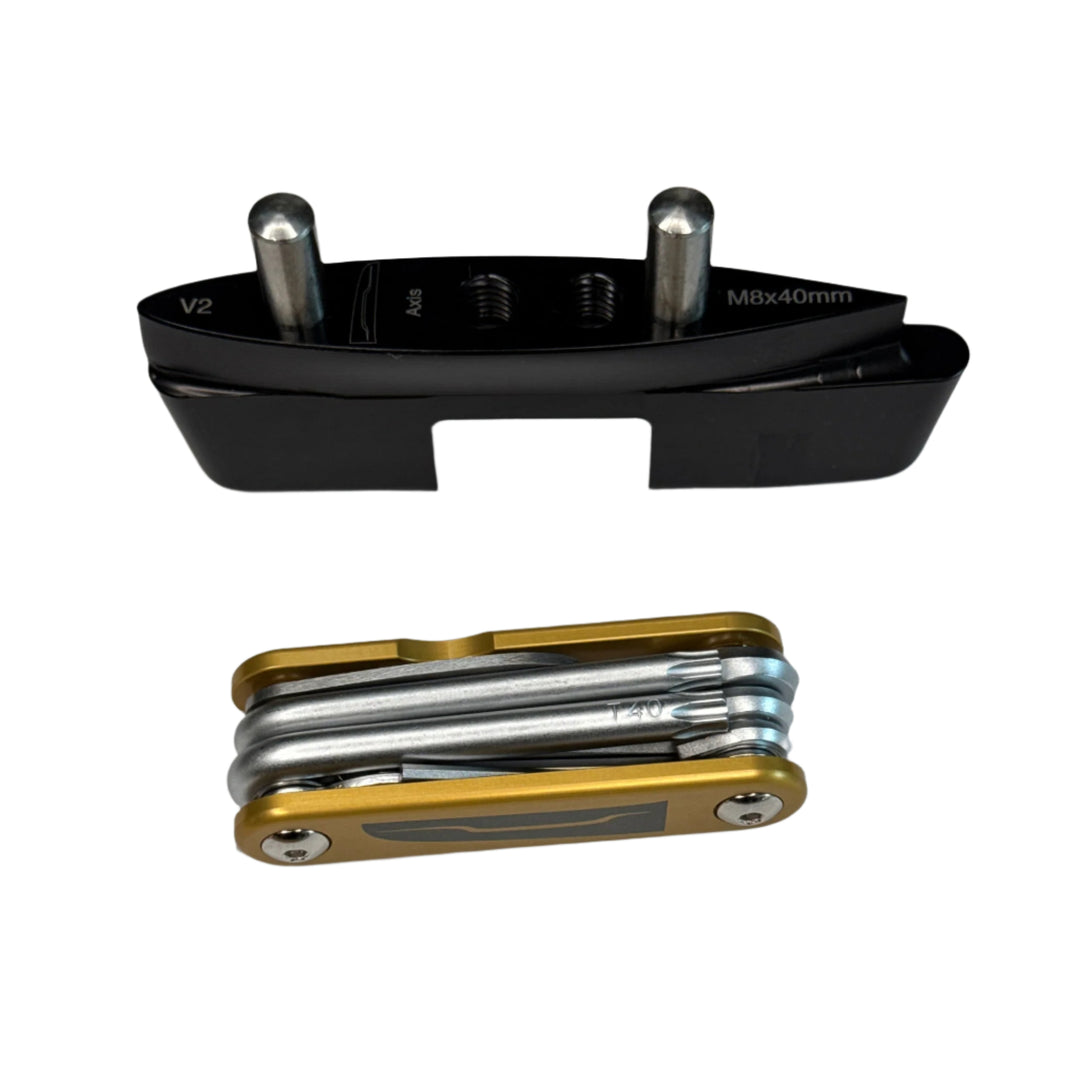 Black and gold multi-tool on a white background